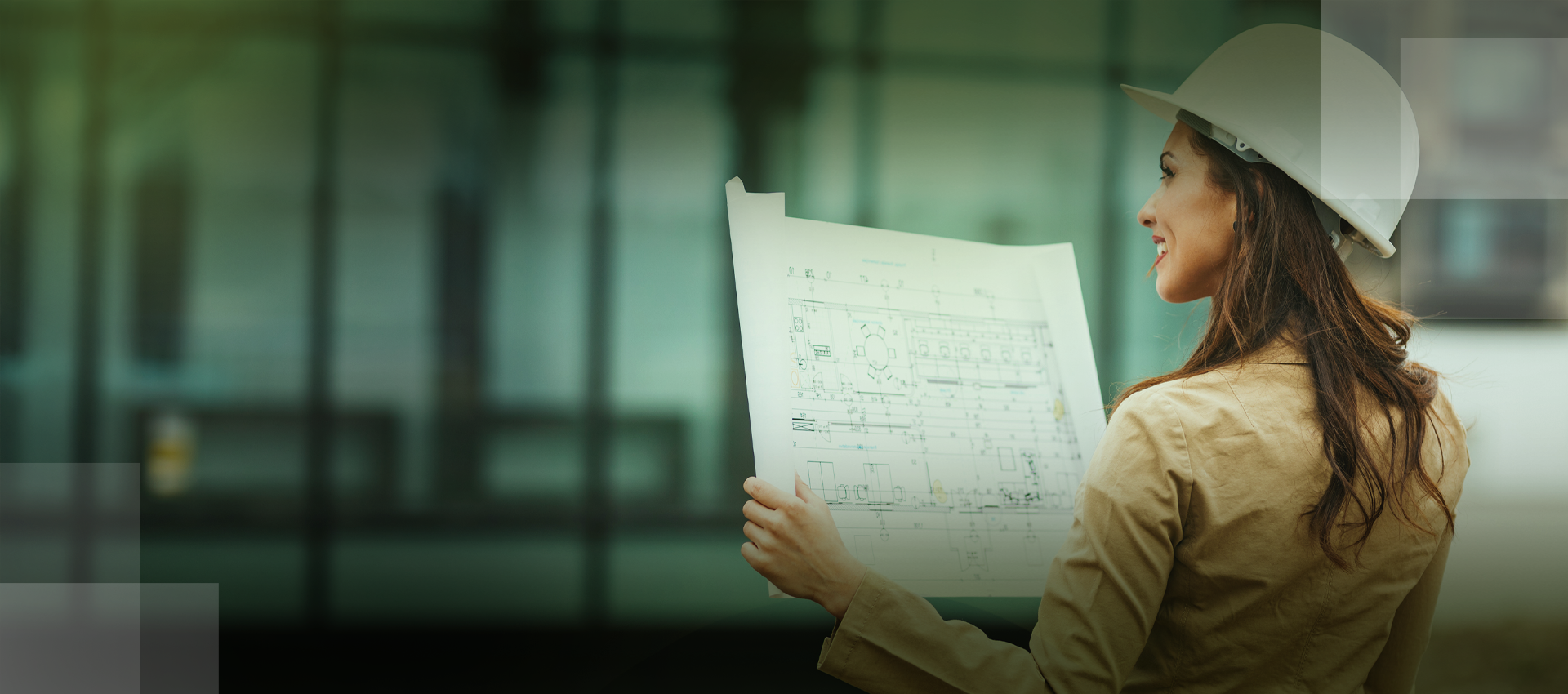 Engenheira com plantas de construção